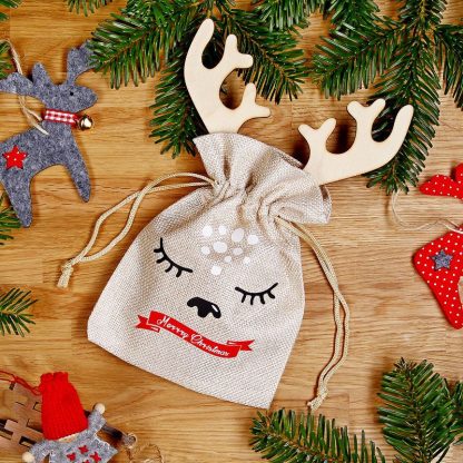 1 stuk Jute zak 13 x 18 cm - Kerstmis + houten kerstbal met hoorns - Afbeelding 2